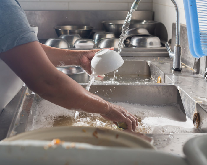 Pour wash water in sink